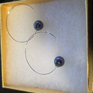 Unique blue pear stainless steel earrings.